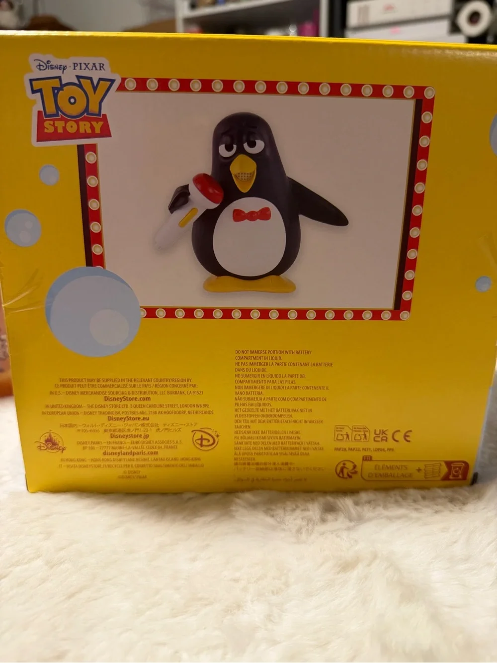 Disney Wheezy Penguin Toy - Black, White, Yellow, Red